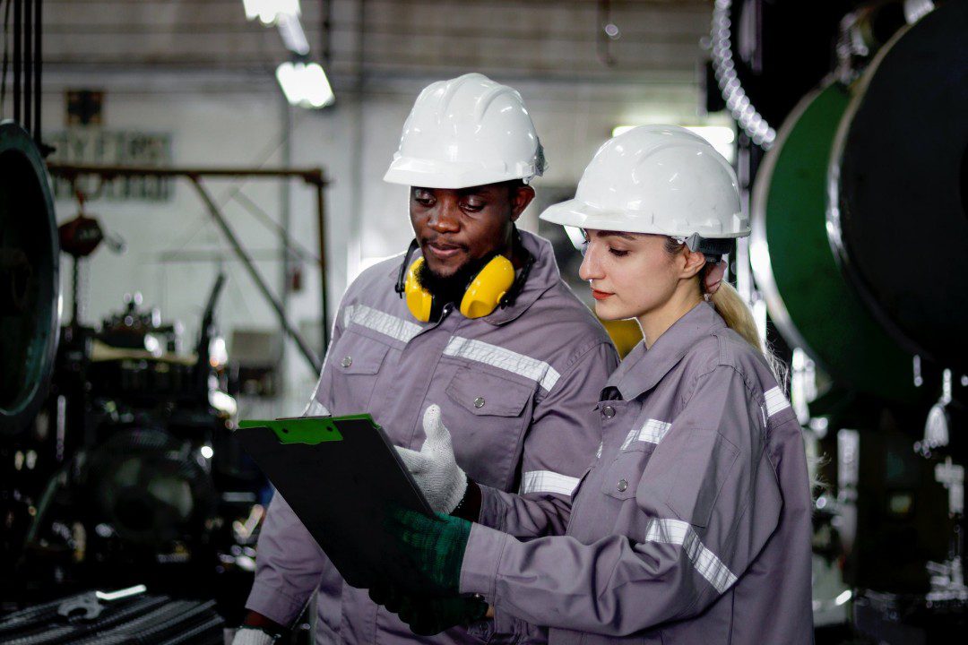 Engineers reviewing pre-design checklist